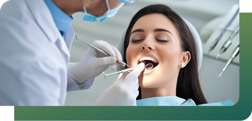 A dentist performing general dentistry on a patient in Woden Dental Centre.