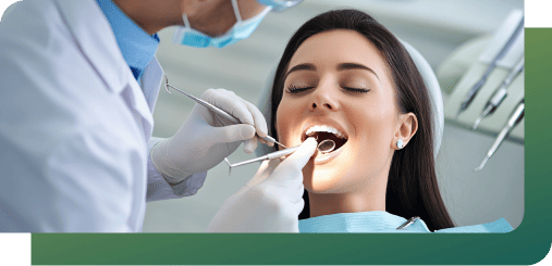 A dentist performing general dentistry on a patient in Woden Dental Centre.
