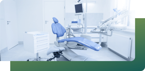 A modern dental clinic with a blue chair, advanced equipment, and strict dental infection control measures for a hygienic environment.