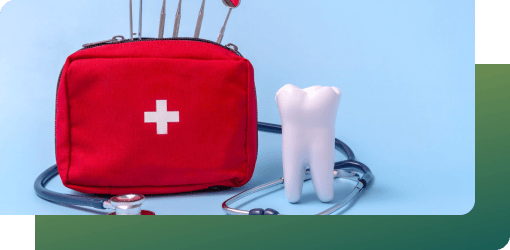 A red first aid kit, stethoscope, and tooth model represent emergency dental care services.