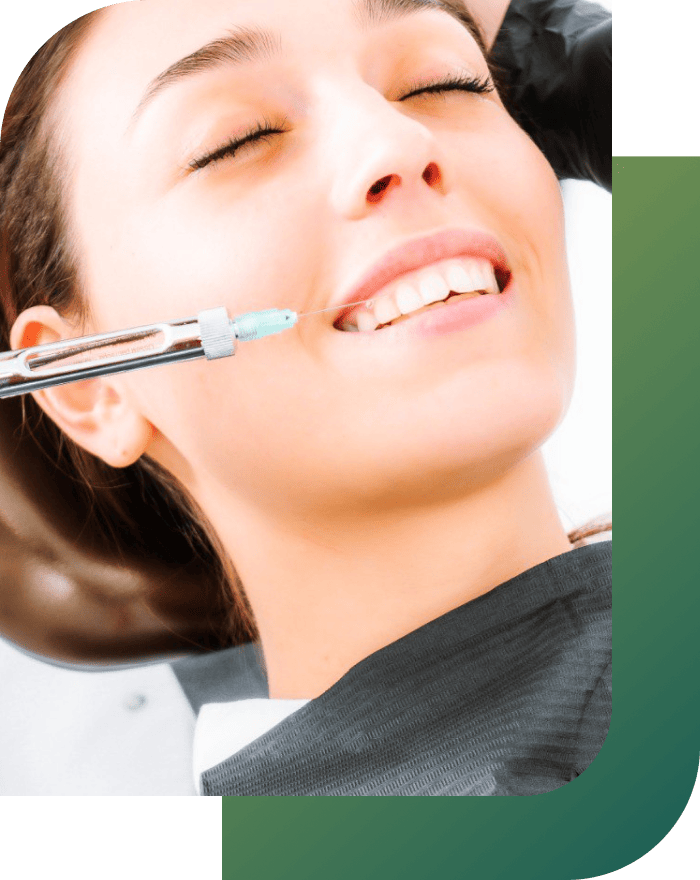 Patient receiving an injection in the teeth as part of dental abscess treatment.
