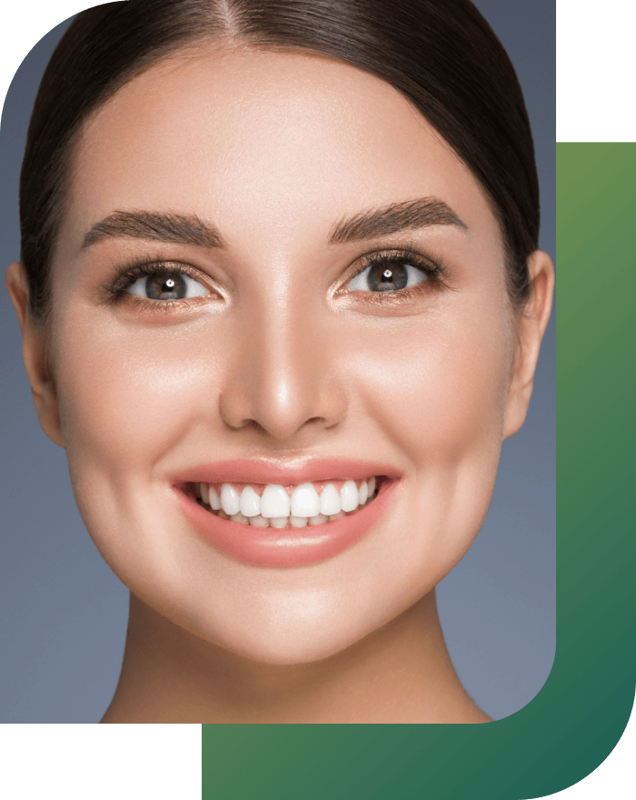 Confident woman showing her smile after a smile makeover.