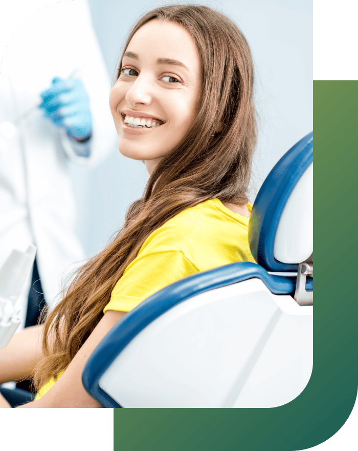Confident smile of a girl after root canal treatment.