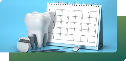 A dental calendar setup with a tooth model, tools, and a calendar, ensuring smile makeover appointments align with your goals.